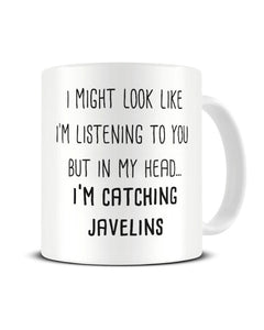 I Might Look Like I'm Listening - I'm Catching Javelins Ceramic Mug